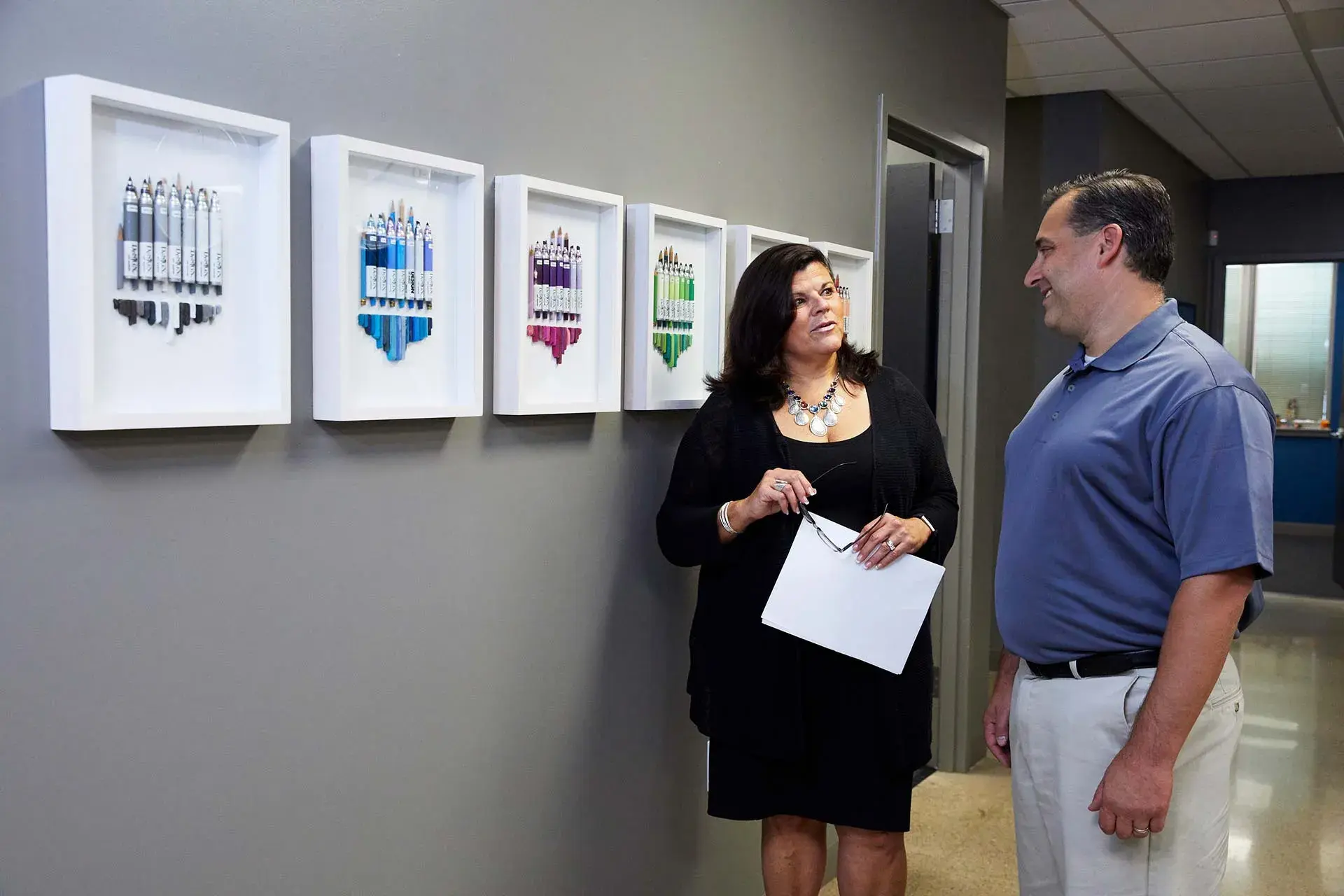 Cooper Smith team discussing marketing materials